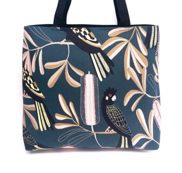 Frida tote back in Jocelyn Proust fabric with black cockatoos and banksias made by Flying Fox Fabrics